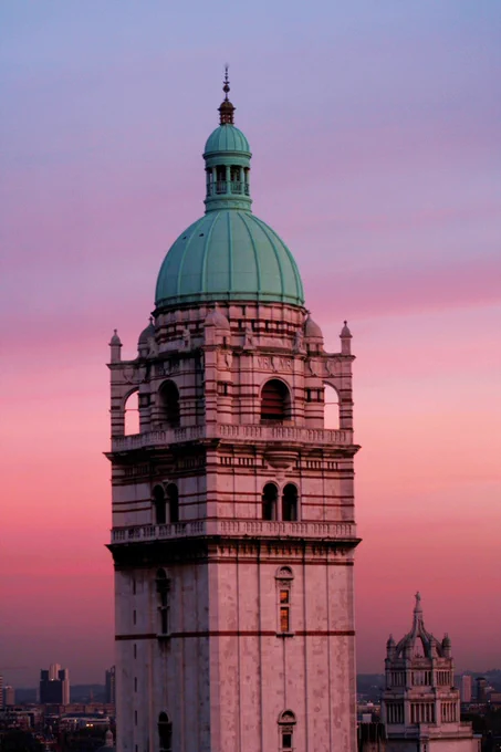The Queen's Tower pictured against a pink sky