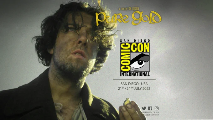 Character from Pure Gold, John, looks into the distance, he holds a golden nugget in his hand. Text overlay has the title "Pure Gold" and the Comic-con logo