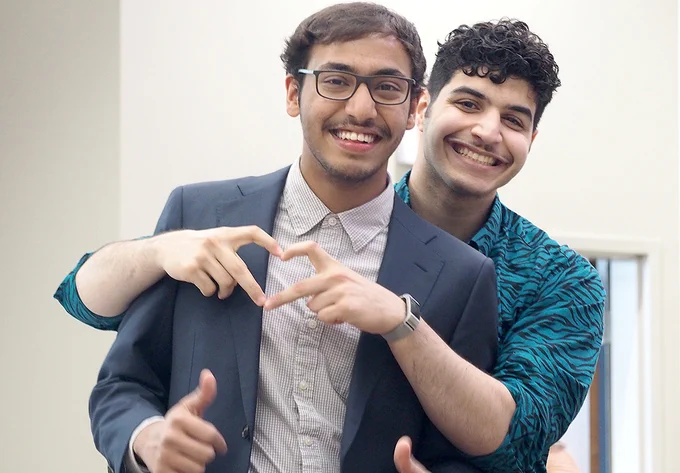 Hassan Mohammed H Al Lail (back) and Basil Faisal M Habiballah (front) pose for a photo following the May 18 KAUST recognition ceremony at the I Hotel.