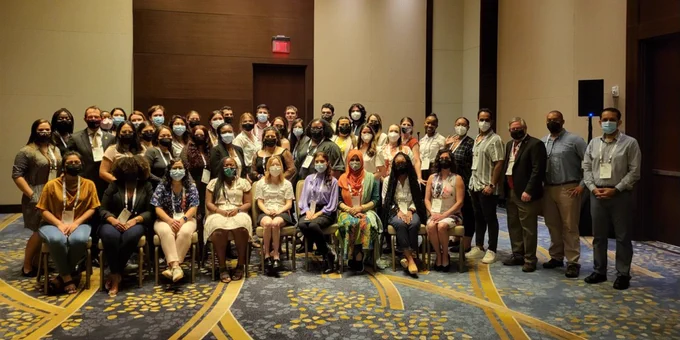 a group of people posing for the camera
