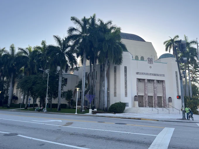Jewish synagogue surrounded by palms