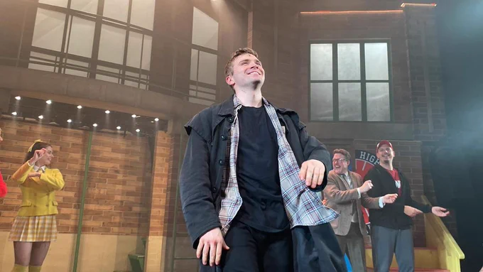 Ben on stage at the curtain call