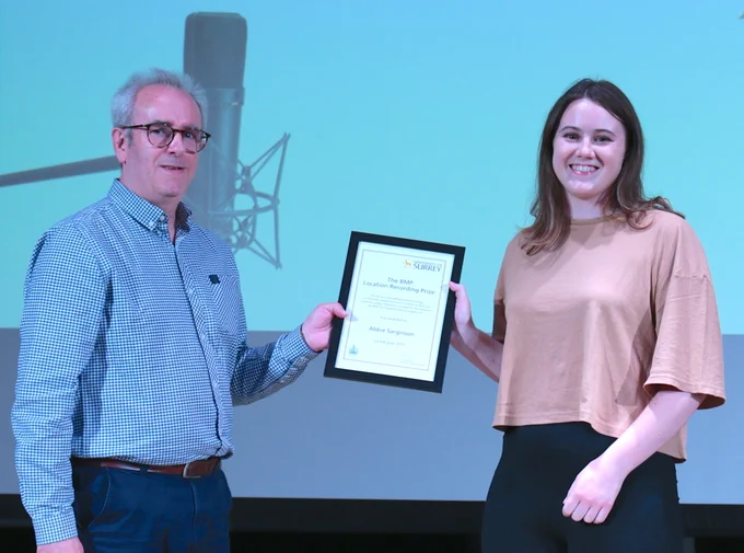 Abbie Sarginson being presented with the BMP Recording Prize 2022 by BMP's Ken Blair