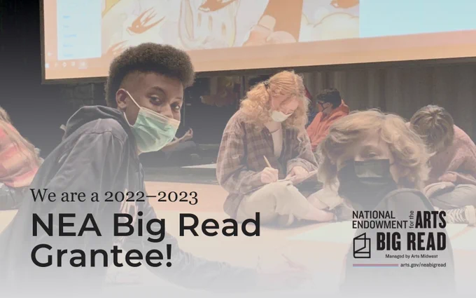 A photo of two kids in masks who are seated and facing the camera. The superimposed text reads We are a 2022-2023 NEA Big Read Grantee!