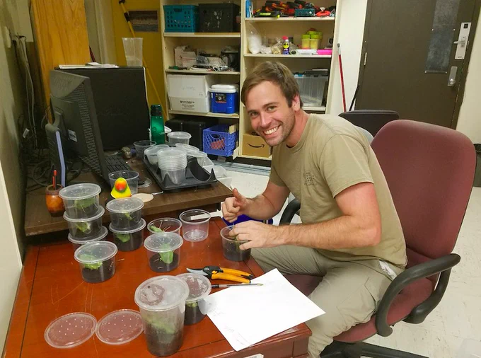 Photo courtesy of Thomas Smith. Thomas sitting at his desk working. 