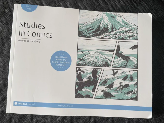 Cover of studies in comics volume 12 number 1, printed in blue and white, with cover image of birds in the ocean