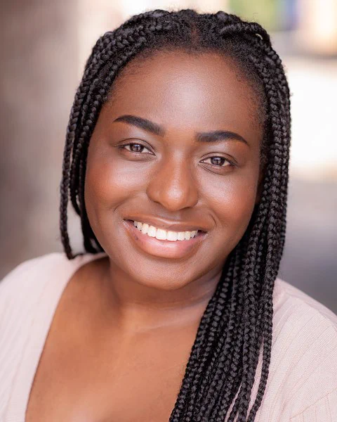Headshot style photo of an actor.