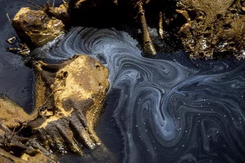 Oil spill in water