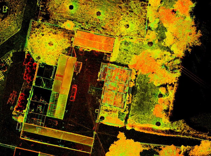 Image of 3d laser scanning point cloud data showing buildings and surrounding land. 