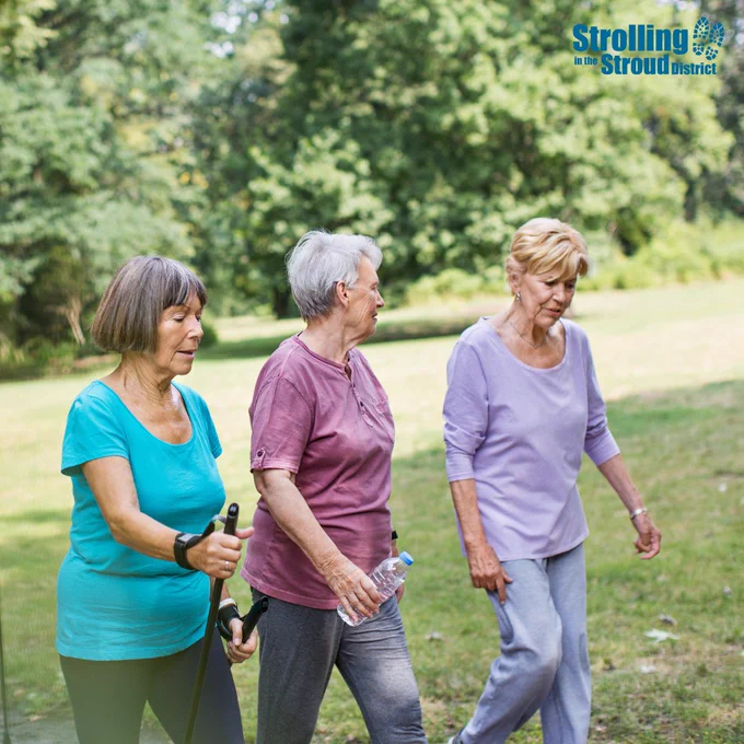 Image of three women walking outdoor with the 'Strolling in Stroud District' logo in the top right hand corner.