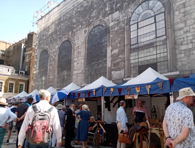 People browsing the Tudor Livery Crafts Fair in Guildhall Yard