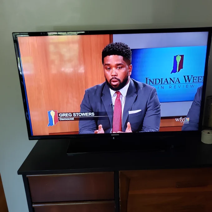 Greg Stowers sitting at a desk answering a question about the need for greater diversity in Indiana's judicial system. 