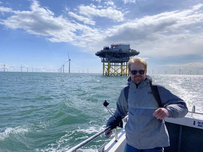 EMPOCI's postdoc Nicholas Goedeking amidst the Rampion offshore wind farm nearby Brighton, UK.