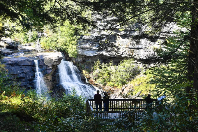 Visitors view the iconic falls at Blackwater Falls State Park in Tucker County