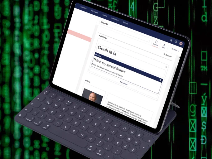 Ipad with keyboard attached, displaying Doc Type Grid Editor in Umbraco, on a Matrix background