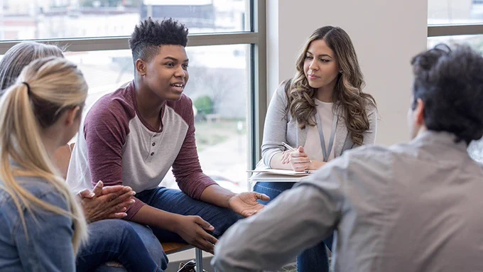 A group of people in discussion