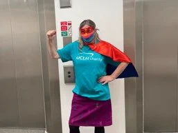 Staff member dressed up as a superhero