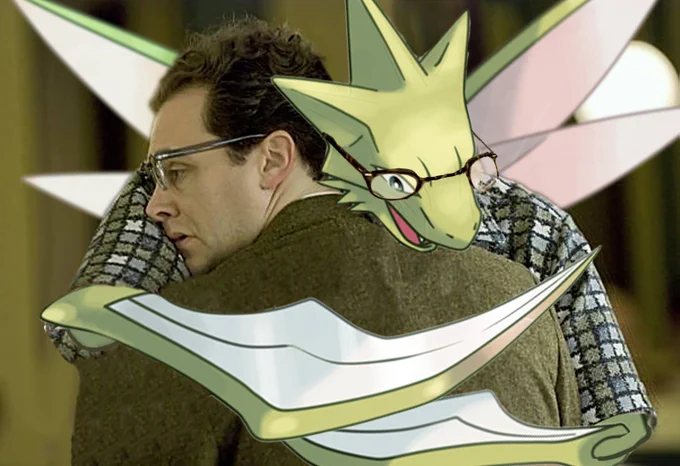 A moment from the 2009 Coen Bros movie, A Serious Man, where Sy Ableman hugs Larry Gopnik. Sy is facing towards the camera, with Larry’s back to us. Except in this case, the actor Fred Melamed has been replaced with the Pokemon Scyther… so it’s Scyther Ableman. A little too much effort was put into the Photoshop.