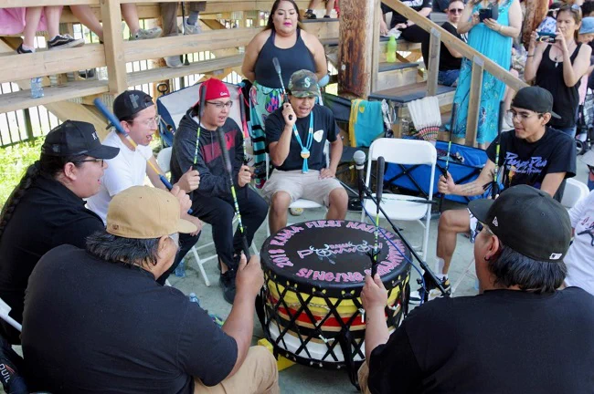 A photo of the Black Lodge Singers at the National Indigenous Peoples Day pow wow at Anemki Wajiw in Fort William First Nation.
