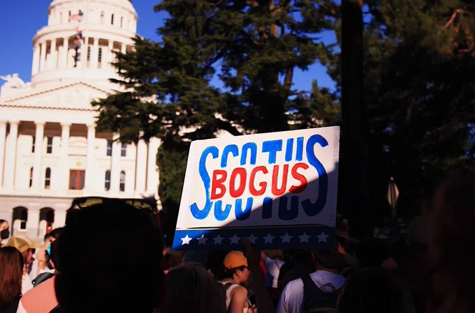 Dozens gather outside of the California state Capitol to protest the U.S. Supreme Court ruling to overturn Roe v. Wade on June 24, 2022.