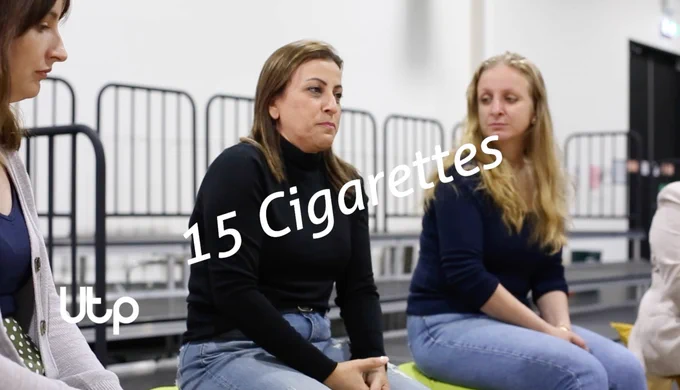 Image of Zizi from Community Minds with white writing that reads '15 Cigarettes'.