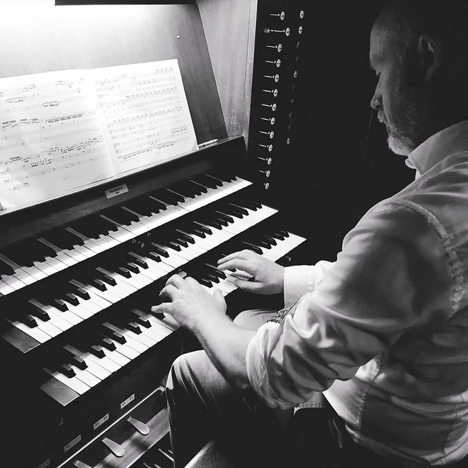 Thomas Charles Marshall at the organ.