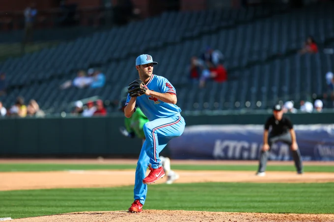 James Naile throws a pitch in the Memphis Redbirds powder blue uniforms.