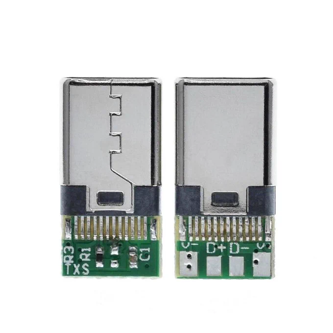 Shows both sides of male USB C connector with the connection pins visible on the breakout board.