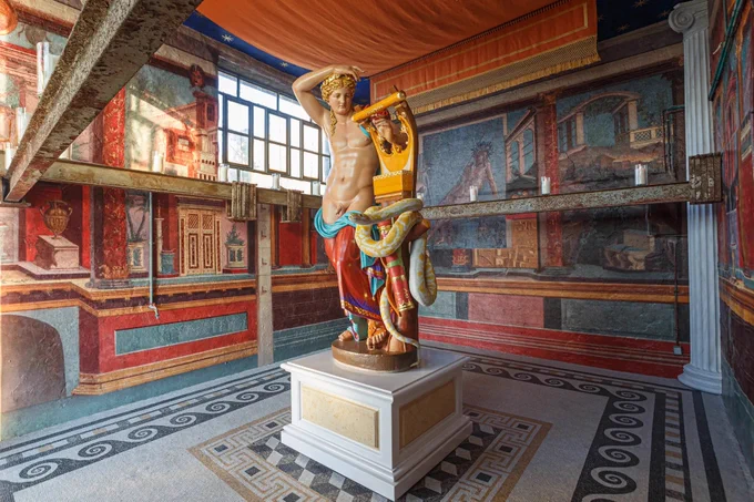 A brightly painted “Apollo Kithara” (2019-22) is part of the “Jeff Koons - Apollo,” show, which opened in June, 2022, on the Greek island of Hydra, at the Project Space Slaughterhouse, run by the Deste Foundation for Contemporary Art.  Photo credit: Eftychia Vlachou