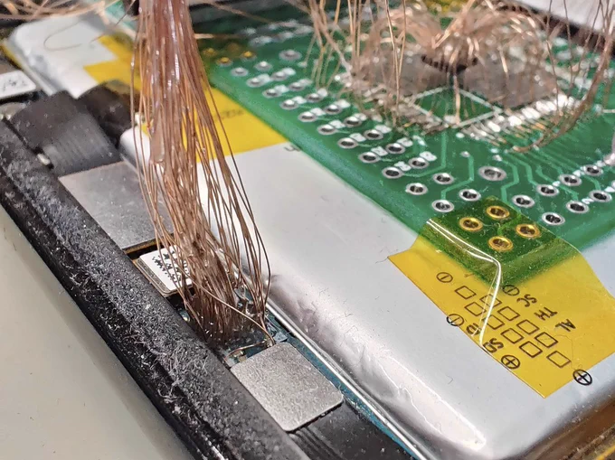 TItan-M chip in a Google Pixel phone with wires soldered for pwnage

