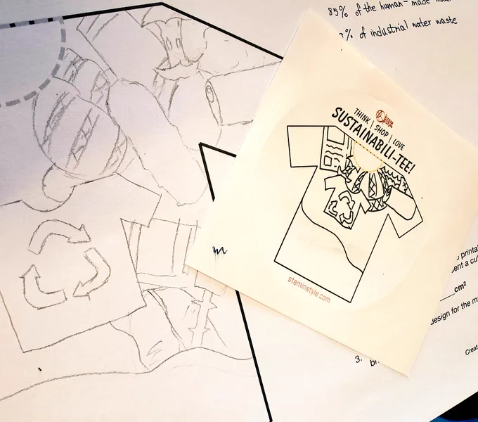 A black and white t-shirt sticker design by a student promoting recycling fashion to reduce environmental impact