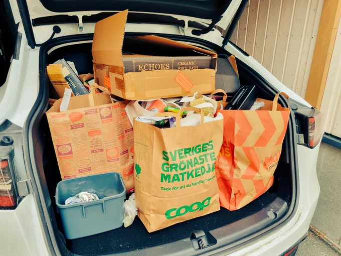 Lots of bags in the trunk. Filled with paper plastics.