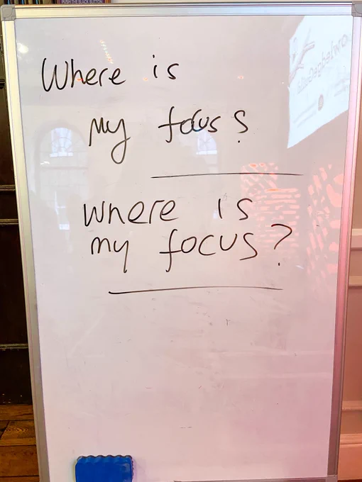 This is a photo of a whiteboard with the question 'where is my focus ' written by Michael from Speakers Corner. This is an activity during Sarah Furness's presentation in Speakers Corner's Knowledge Guild showcase about Leadership under pressure at the Brewery London. 