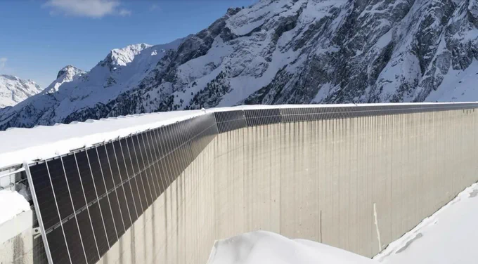 photo of solar panels in snow-covered mountains