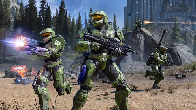 4 Master Chiefs battling it out on Zeta Halo during network co-op.