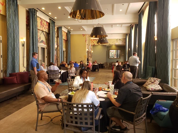 Oklahoma School Innovation Summit attendees eating lunch together.