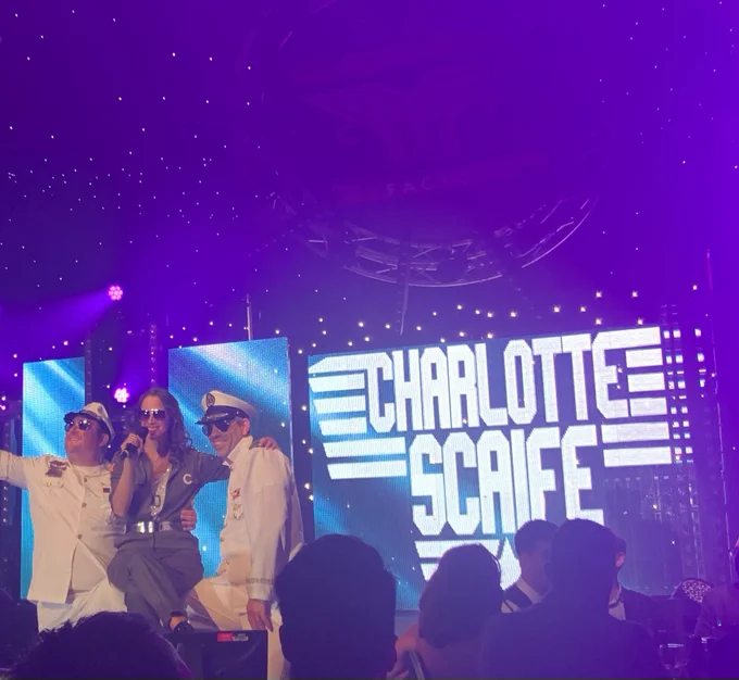 Charlotte on stage with her wingmen at the end of her Crypt Factor performance