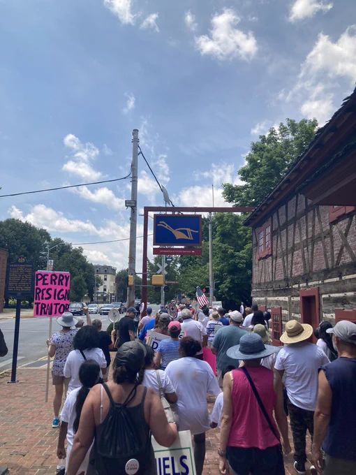 Group marching and carrying signs