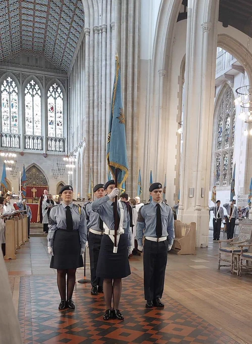 The Banner of Norfolk and Suffolk Air Cadet Wing being carried in Bury St Edmund’s Cathedral