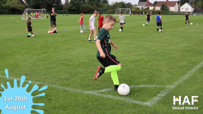 Image of boy playing football with a splash shaped graphic saying '1st-26th August