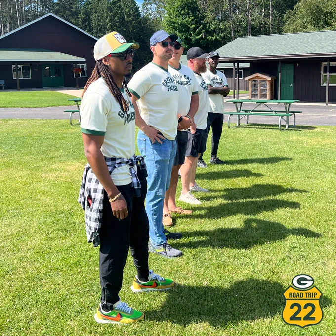 Tramon Williams, Jason Spitz, Tony Moll, Scott Wells & James Starks stand in line while talking to the Wisconsin Lions Camp.