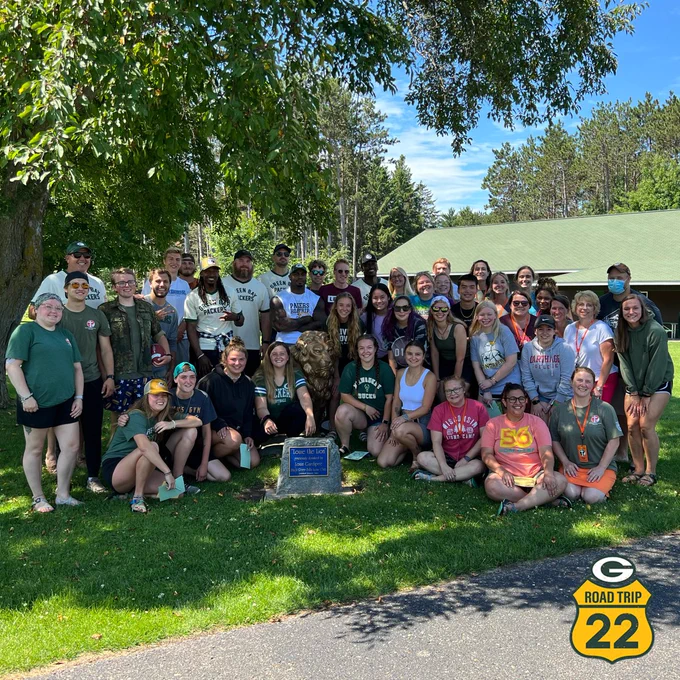 The Packers Road Trip takes a group photo with the Wisconsin Lions Camp.