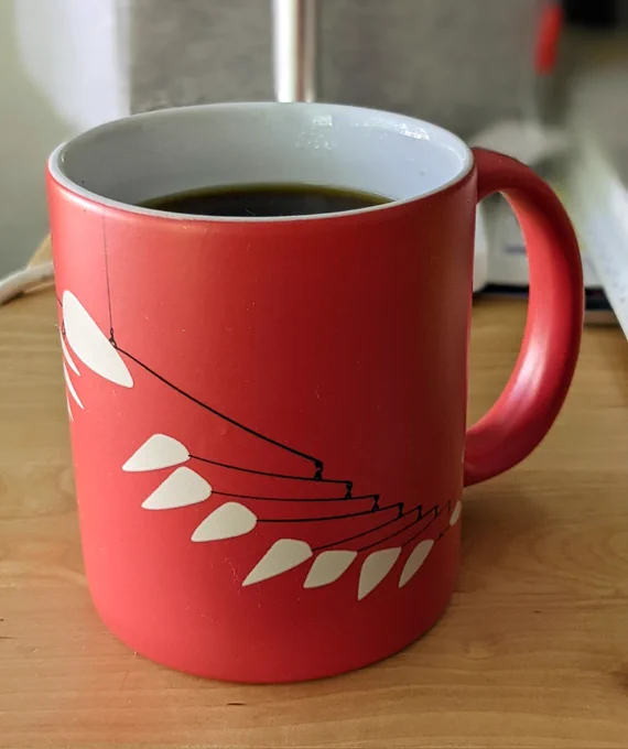 Coffee cup with mobile design by Alexander Calder