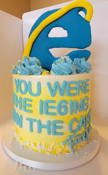 A large cake featuring the IE6 logo and the text “You were the IE6ing on the cake.”