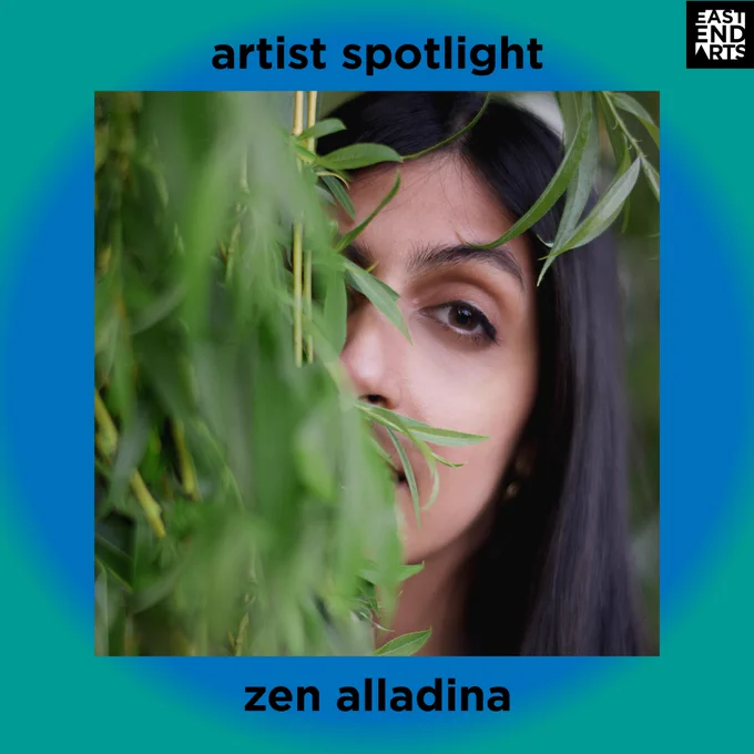 A headshot of Zen Alladina, a South Asian woman. She is standing behind a tree or plant, and the leaves obscure half of her face. 