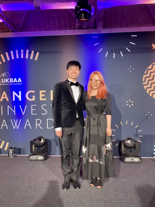 Lia and Tsz in black tie attire - wearing all black