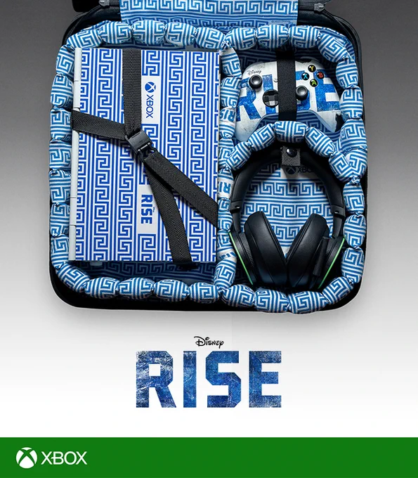 Image of the interior of a custom Rise travel case filled with a wireless Xbox headset, custom Rise Xbox controller and a custom Rise Xbox Series S console. The custom Rise console and travel case interior have an intricate blue and white Greek pattern.