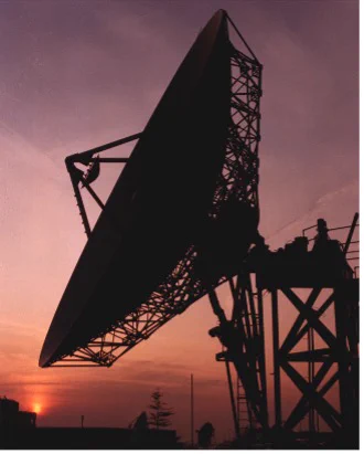 The silhouette of a satellite dish at GCHQ's Bude site