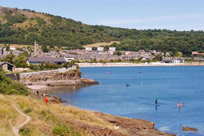 Burntisland bay with paddleboards on the water