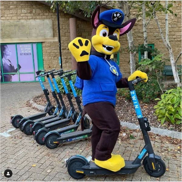 zwing mascot on an e-scooter